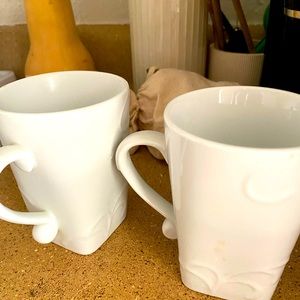 Set of two white mugs